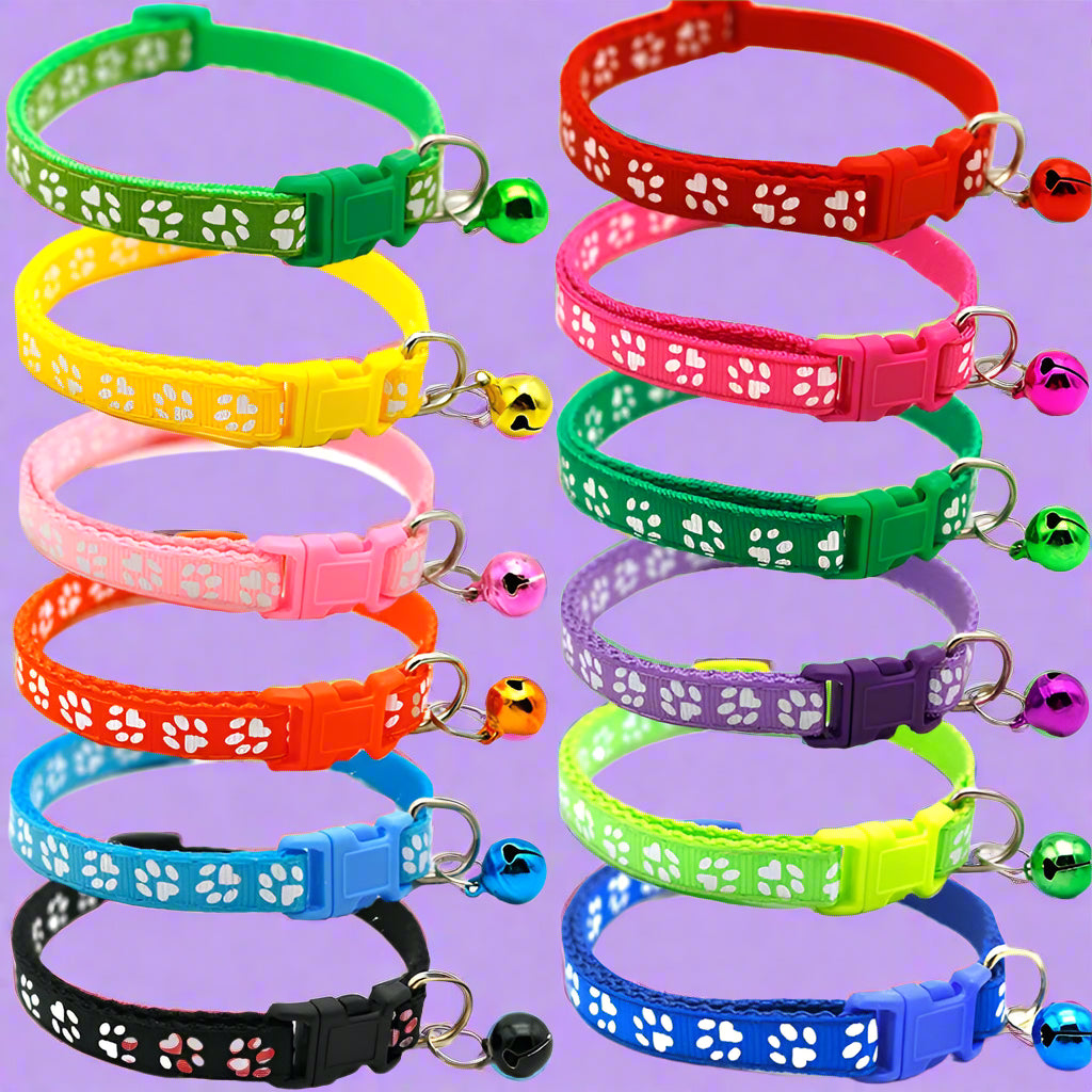 Colorful cat collars with paw pattern and small bells