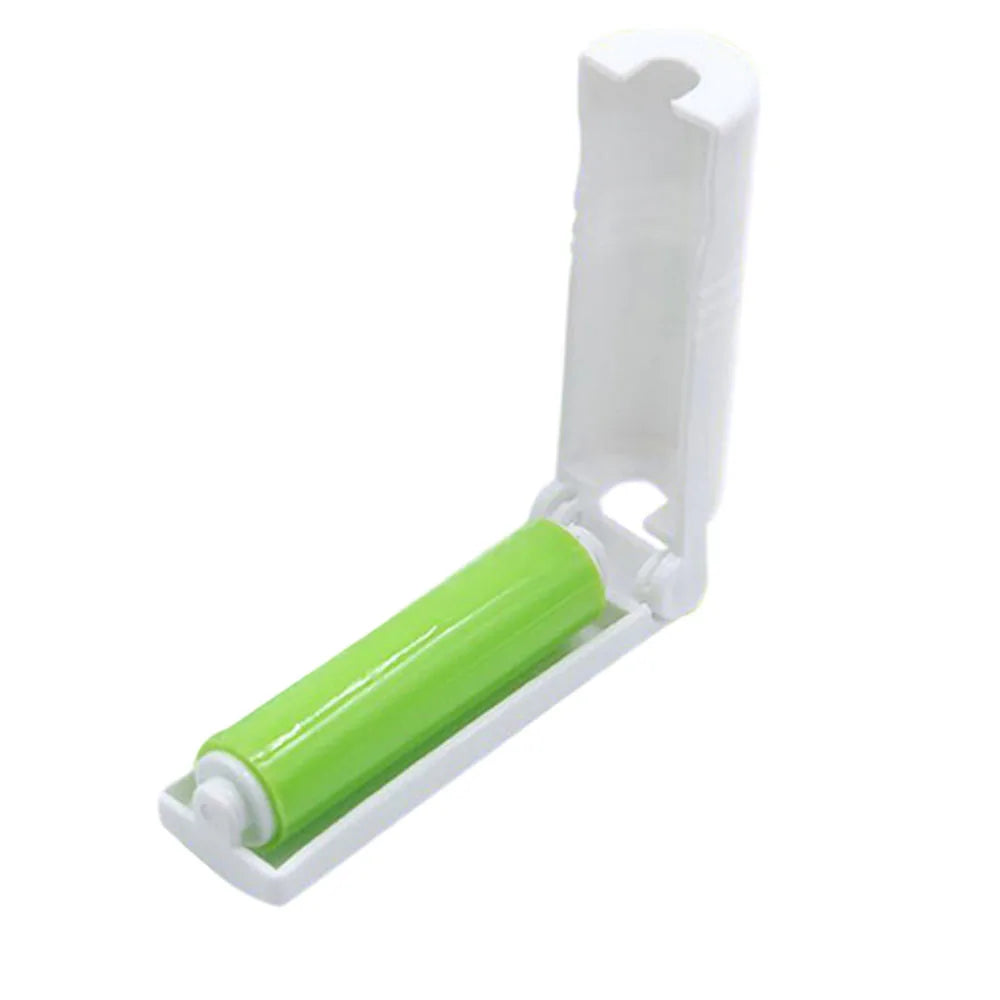 Green lint roller with white handle for pet hairs