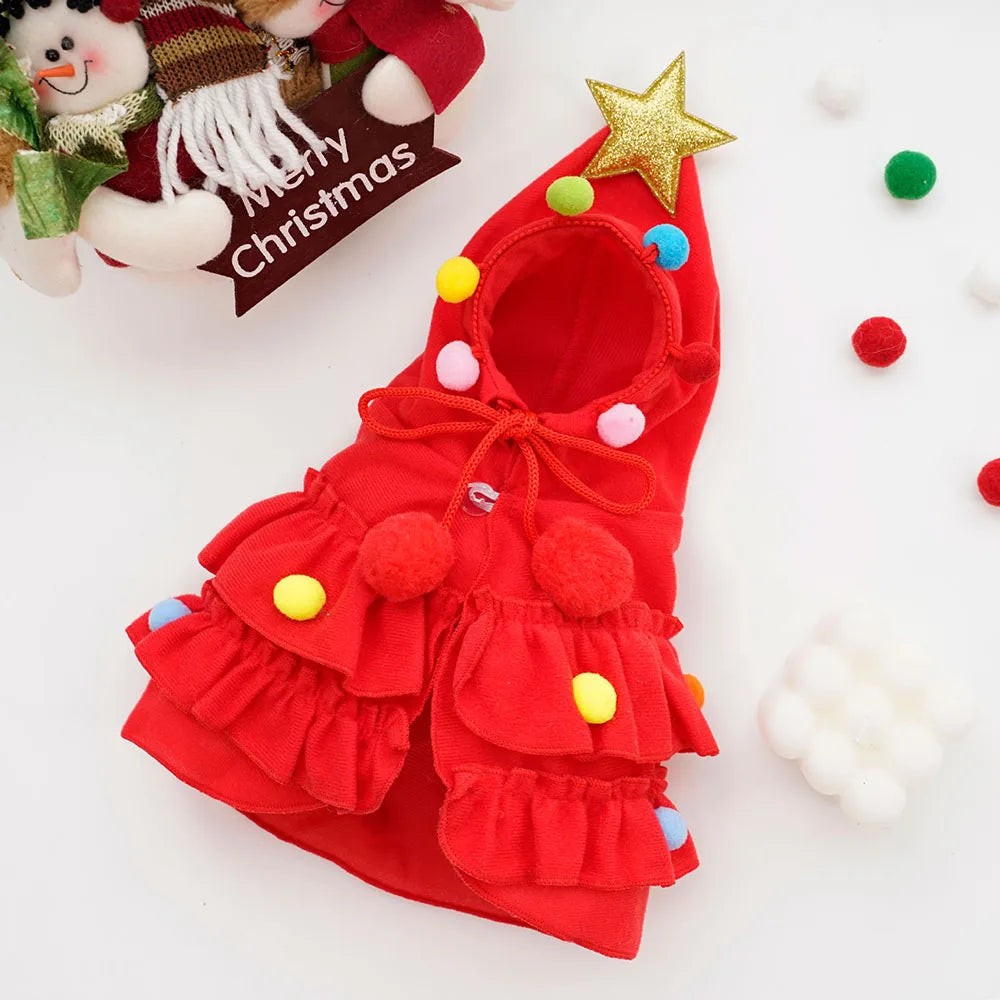 Red Christmas pet dress with colorful pom-poms.