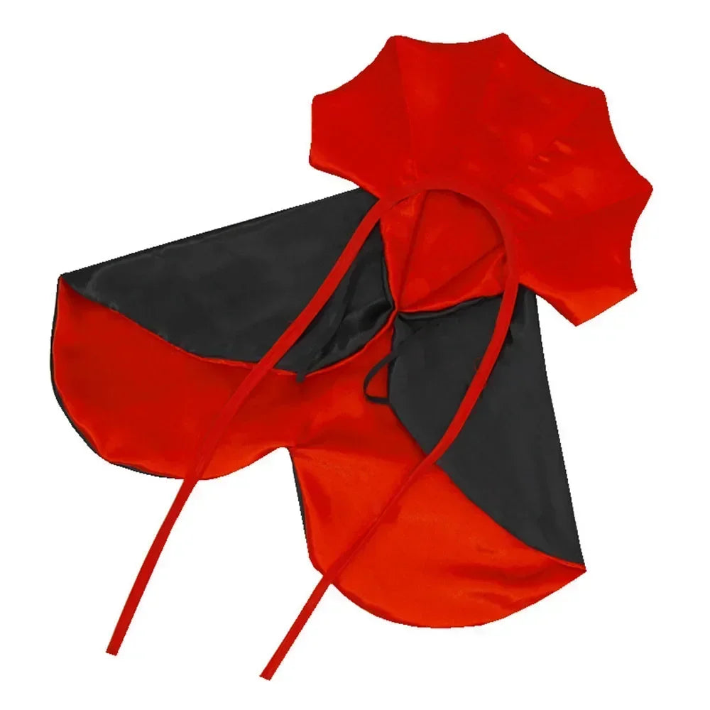 Red and black cape with hood on a white background