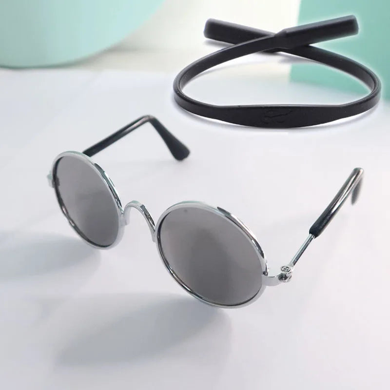 Round sunglasses with black frame and gray lenses for pets