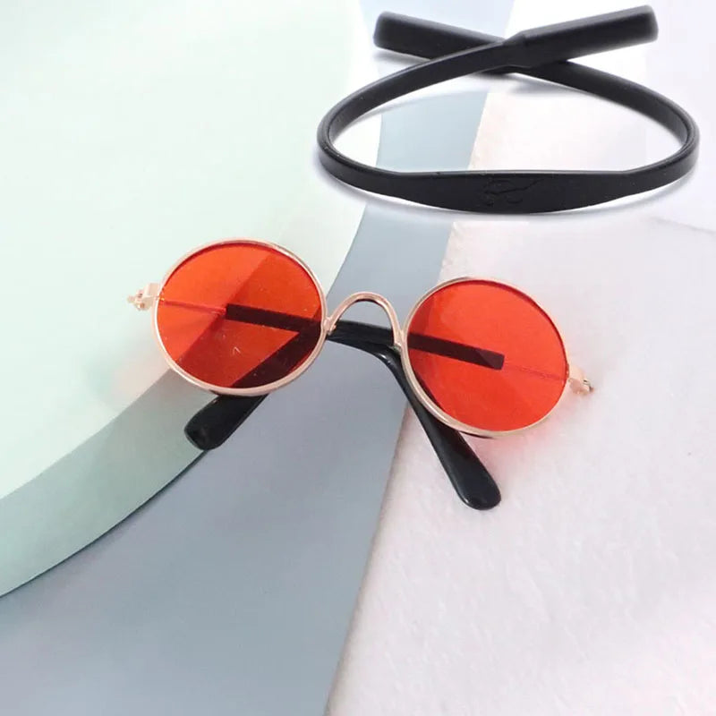 Round sunglasses with red lenses and black frames for pet cat and dog